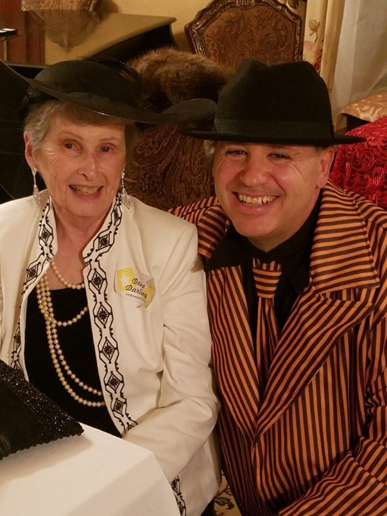 Two people having a wonderful time participating in our murder mystery at our Dover NH area hotels