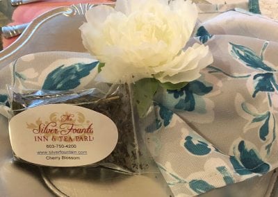 If you are looking for fun things to do near portsmouth nh, give us a visit. Our tea parlor is jam packed with fresh tea and yummy delights. This image showcases a bag of loose leaf cherry blossom team on a silver plate.