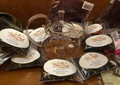Here are a number of bags of loose leaf tea showcased around a glass tea pot. This experience is one of the best things to do near portsmouth NH that you cannot miss out on. Tea bags include, berry creme, earl grey, carmelita, and chocolate truffle.