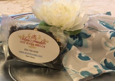 Here is a shot showcasing our loose leaf tea. This image shows a bag of earl grey on a place setting. Our tea parlor is on everyone's list as the top things to do on seacoast nh.