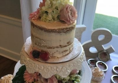 beautiful naked cake with fresh flowers and sugared fruit!