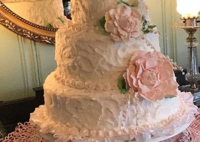 Italian meringue buttercream over a white chocolate wedding cake for that special wedding day!